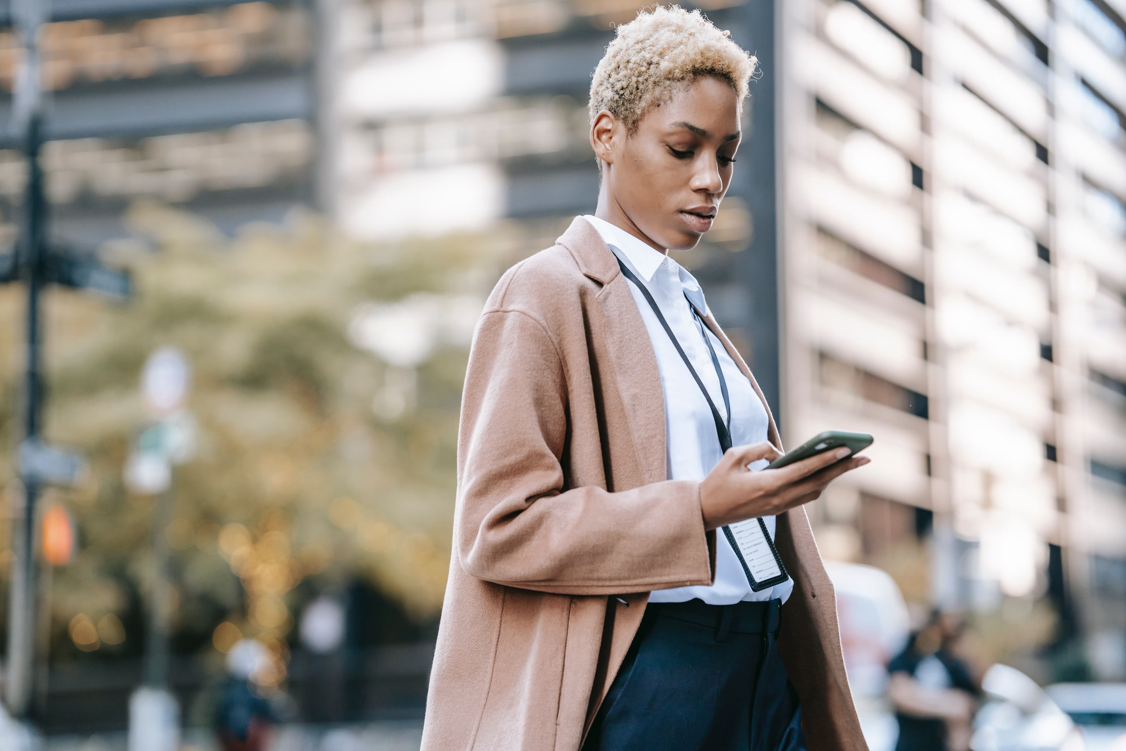 black woman explore career options on her smartphone